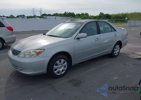 2002 Toyota Camry Le from USA, damaged, VIN 4T1BE32K82U522019